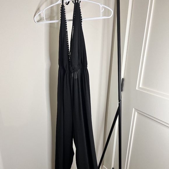 BLACK HALTER FIT AND FLARE JUMPSUIT - Picture 1 of 3